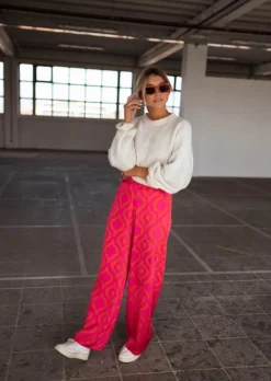 Online Pantalon Thaly rose avec motifs oranges | Pantalon satiné fluide | Prêt-à-porter en ligne | Easy Clothes Femme Pantalons